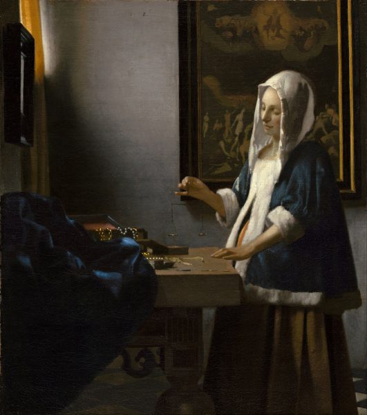 woman-holding-a-balance-johannes-vermeer